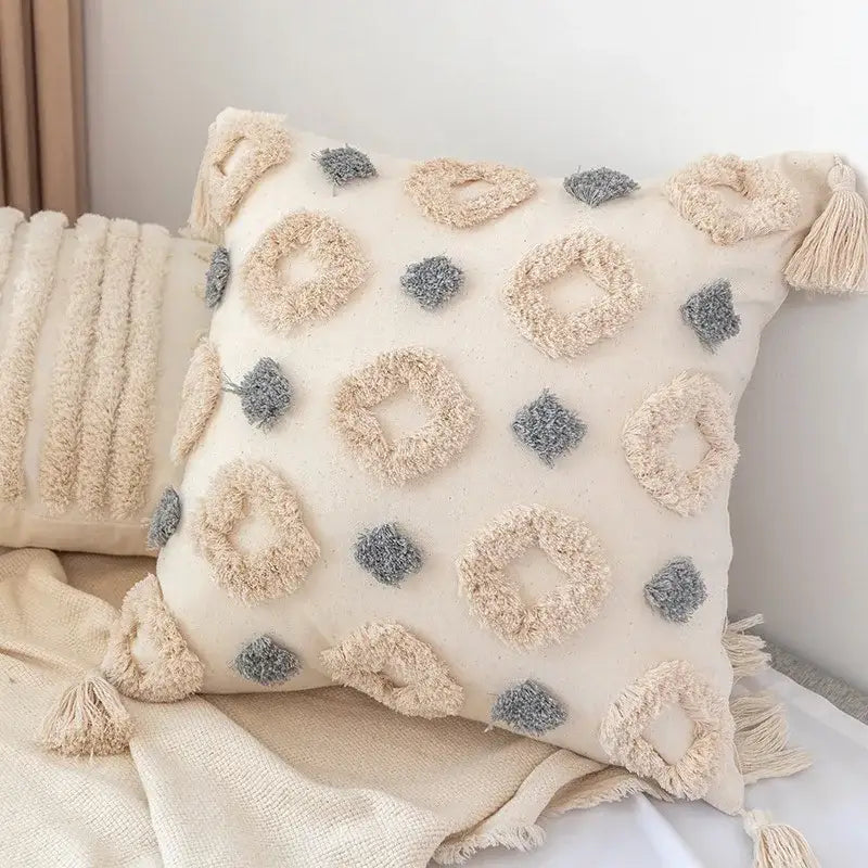 Cream-colored pillow cover with beige and gray textured looped tassels boho geometric tufted for living room decorbites