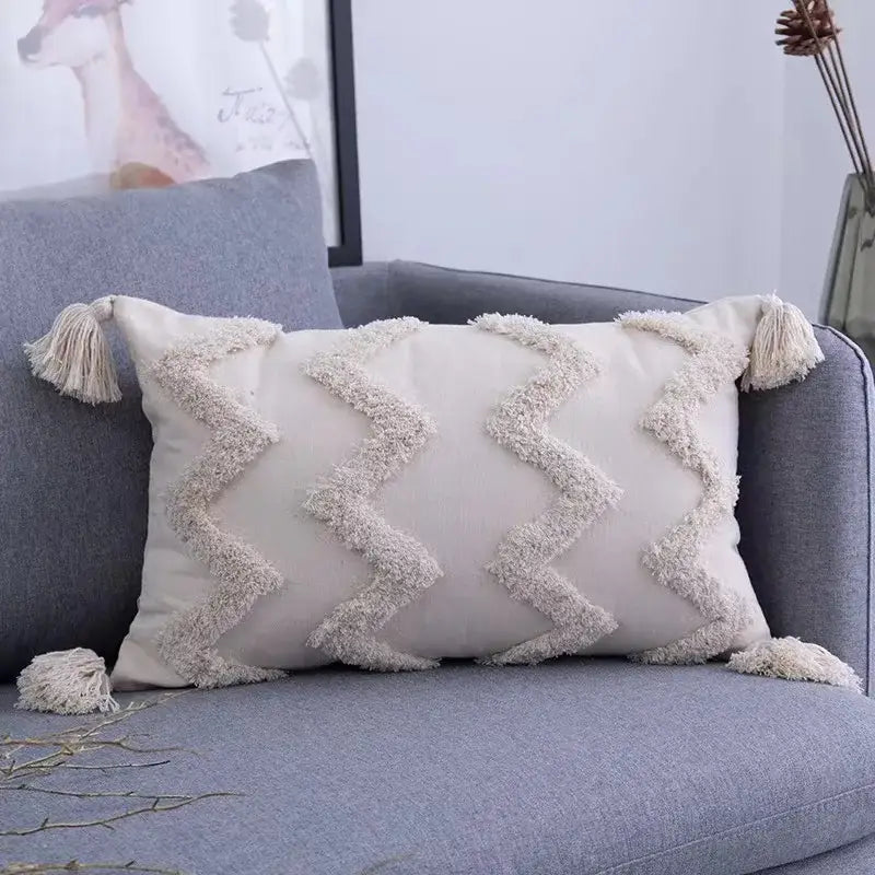 Cream-colored boho geometric tufted pillow cover with textured zigzag fringe and tassels for living room decorbites cushion cover set