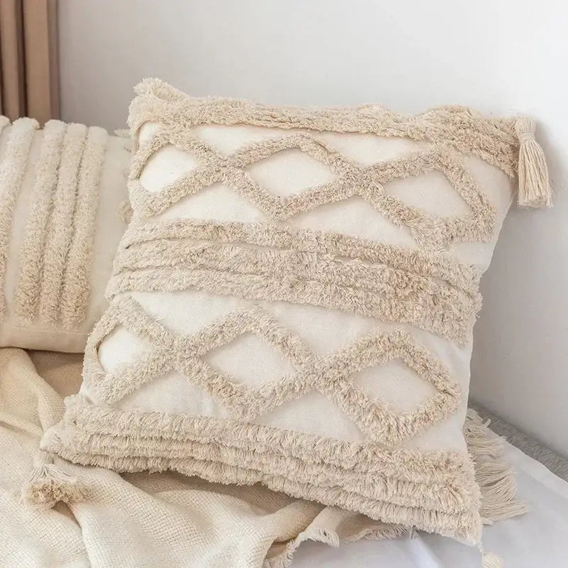 Cream-colored boho geometric tufted pillow cover with textured fringed patterns and tassels for living room decorbites set of 4