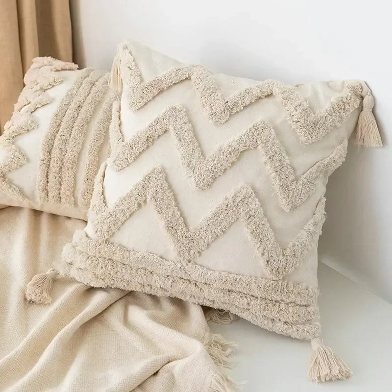 Cream-colored boho geometric tufted pillow cover with textured zigzag pattern and tassels for living room decorbites set of 4
