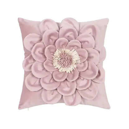 A plush pink velvet pillow cover with a 3d layered flower design and textured cream center in a decorbites geometric tufted set