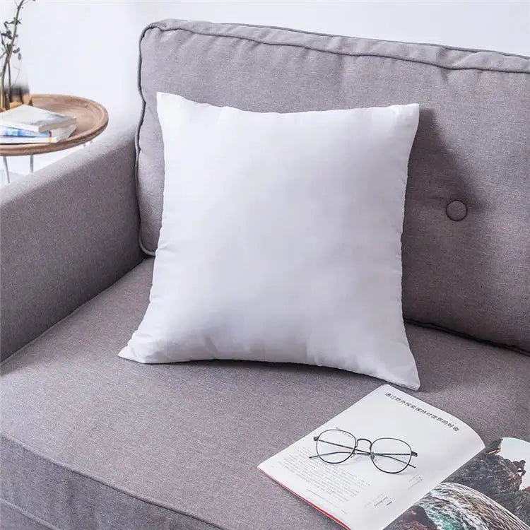 White square pillow cover with soft plush fabric in boho ivory brown color on gray sofa for decorbites boho ivory decor