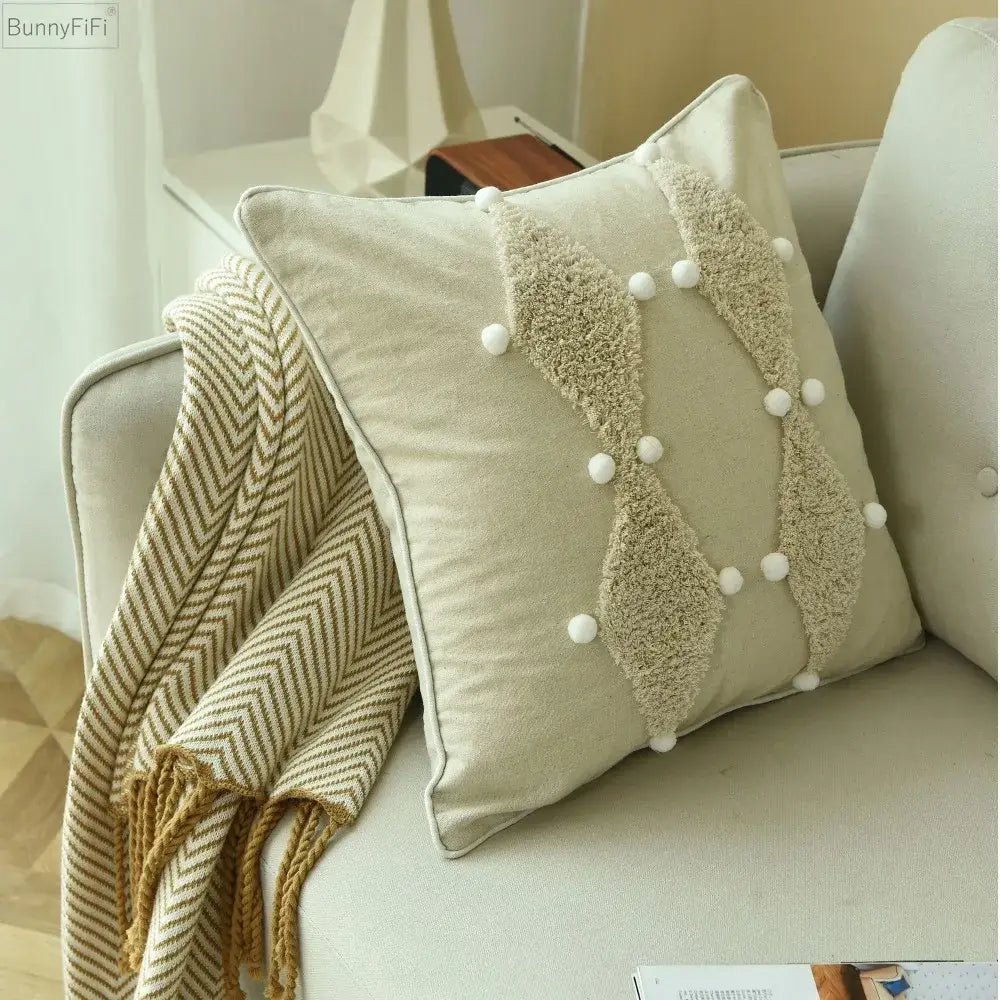 Beige Boho ivory cushion cover with textured fluffy appliqué panels and colorful pompoms for bedroom decorbites decor