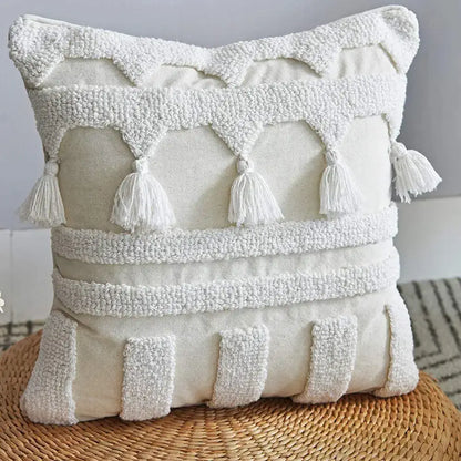 Boho ivory tufted tassel cushion cover with cream fabric, textured white tassels, and woven pillow accents for living room decor