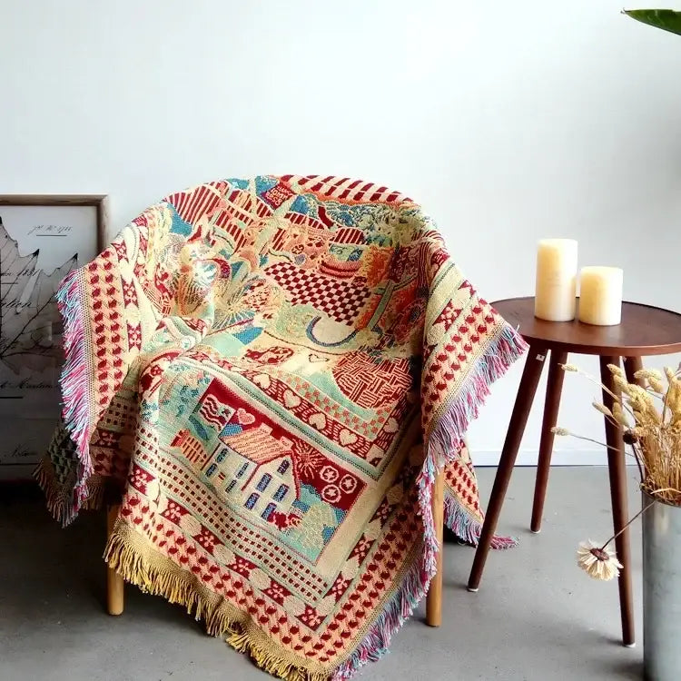 Cozy multicolored decorbites boho jacquard knit throw blanket with patchwork houses in red and cream for living room decor