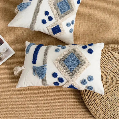 White rectangular boho loop tufted pillow cover with blue gray geometric embroidery and tassels for decorbites decor