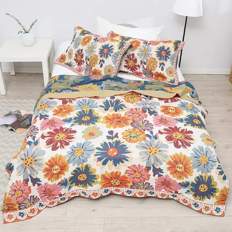 Boho mandala cotton summer blanket with vibrant floral pattern and lace trim in teal orange and cream by decorbites
