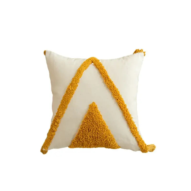 Cream-colored cushion cover with mustard geometric tufted embroidered triangle and tassels for boho living room decorbites decor