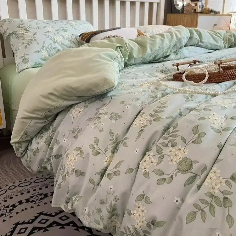 Light green bedding set with delicate white and olive leaf boho pattern printed by decorbites for bedroom decor