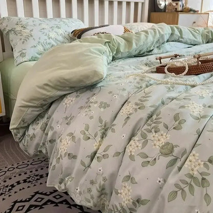 Light green bedding set with delicate white and olive leaf boho pattern printed by decorbites for bedroom decor