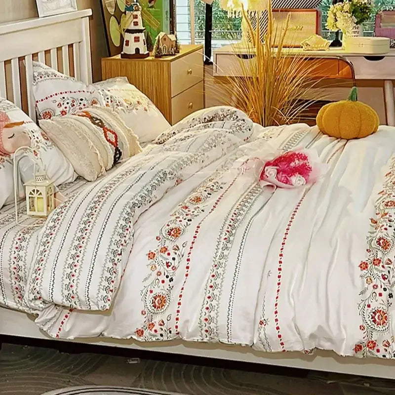 White duvet set with embroidered red orange and green floral stripes in decorbites boho pattern printed bedding set