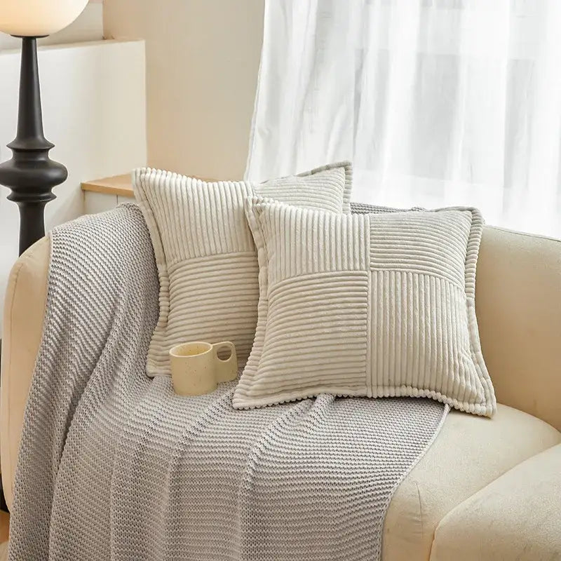 Cream-colored corduroy boho striped pillow covers with ribbed texture and stitched panels for decorbites living room decor