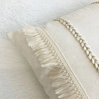 Boho style beige linen cushion cover with cream color, delicate white fringe, and braided embroidery for living room decorbites boho style