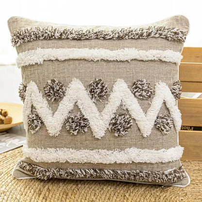 Beige linen cushion cover with white and gray fringe trim pom-poms and zigzag tassels decorbites boho style tufted design