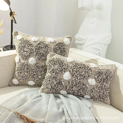 Beige cushion cover with boho style tufted fluffy circular patterns in brown and white by decorbites for living room decor