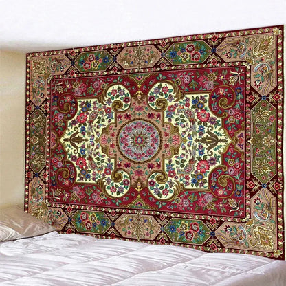 A decorbites boho tapestry set in red and gold featuring intricate floral motifs hanging above a bedroom bed