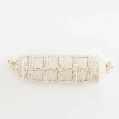 Beige cylindrical cushion cover with textured grid pattern and tied ends for decorbites boho tassel living room decor