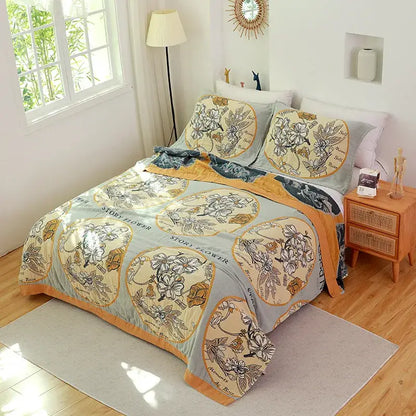 Boho teal floral cotton cover throw blanket with light blue and cream floral pattern and gold trim for bedroom use