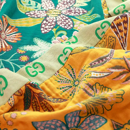 Boho teal floral cotton cover throw blanket featuring vibrant gucci fabric with bold green orange and purple motifs