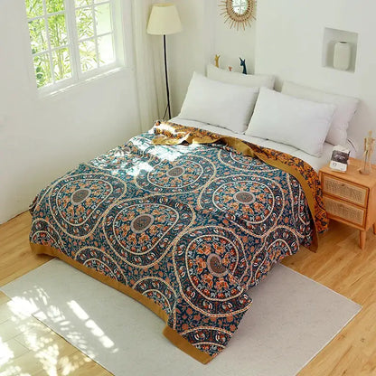 Boho teal and gold elephant cotton throw blanket featuring a teal and orange mandala-patterned bedspread with gold border decorbites cotton boho