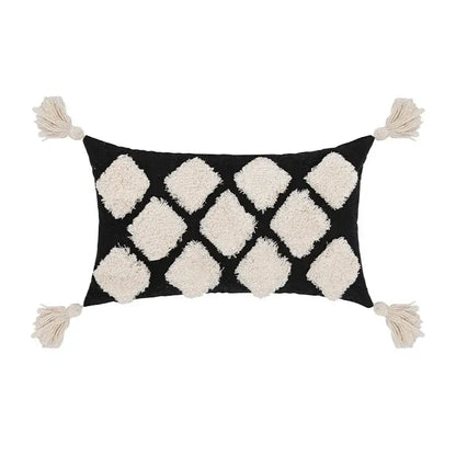 Black rectangular pillow cover with cream diamond-shaped tassels and corner accents for decorbites boho tufted beige decor