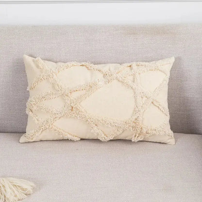 Cream-colored boho tufted beige pillow cover with textured frayed geometric pattern for living room decorbites tassel decor