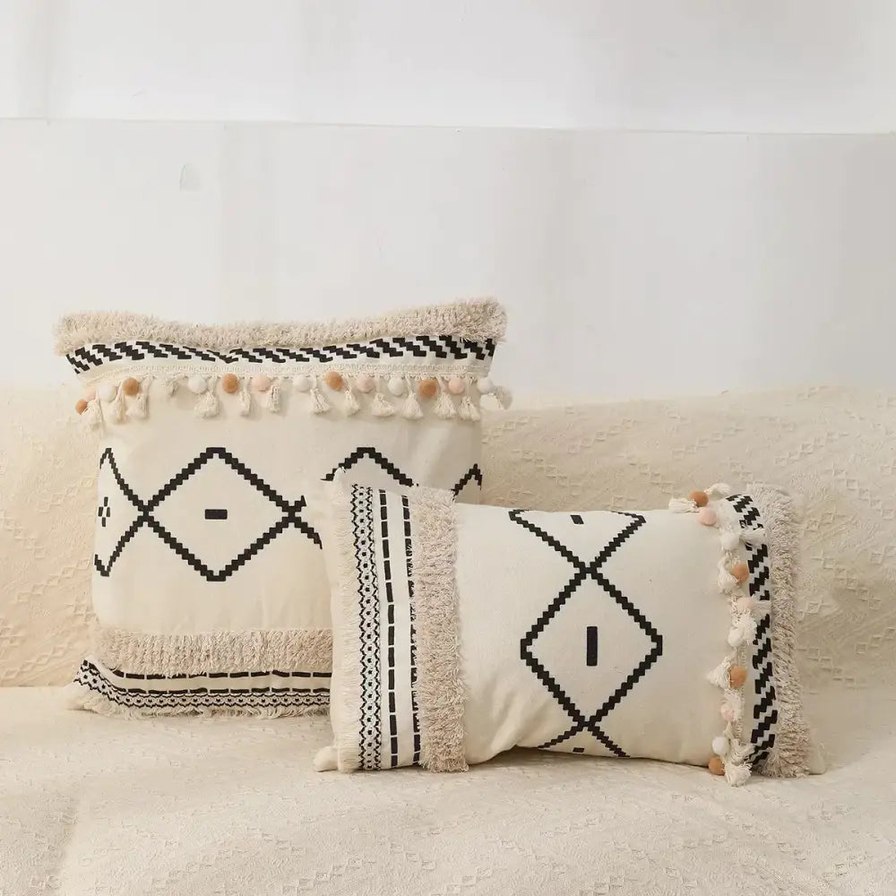 Cream-colored boho tufted fringed black pillowcase with geometric patterns and tassels for living room decorbites decor