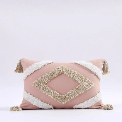 A blush pink boho tufted tassel cushion cover with cream diamond pattern and tassels for living room decorbites decor