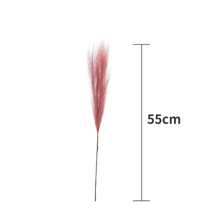A 55cm tall artificial pink feather grass stem with a dark green stalk for boho white beige fluffy pampas grass decorbites