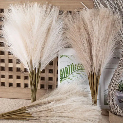 Three tall boho white and beige fluffy pampas grass stems with soft plumes for living room decor by decorbites
