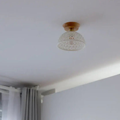 Delicate white glass pendant light with geometric lattice design mounted on wood base for wood led ceiling decorbites copper wood