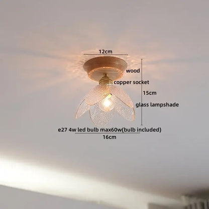 A delicate flower-shaped glass lampshade with a textured finish on a copper wood led ceiling light for bedroom decorbites decor