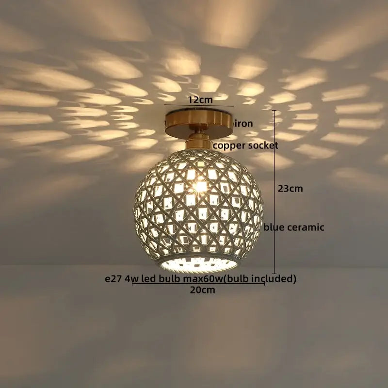 A spherical blue ceramic pendant light with copper wood led socket and iron mounting casting geometric shadows for bedroom decorbites wood led ceiling