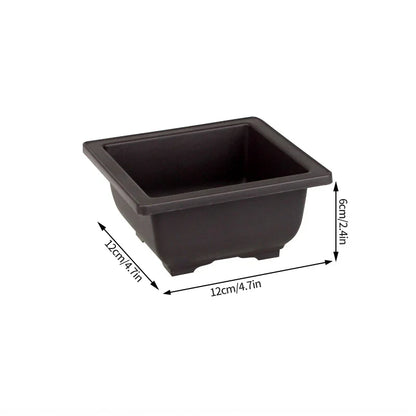 Black rectangular plastic plant pot with rounded corners and raised rim for succulents and para plantas outdoor use