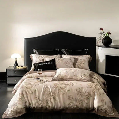 Elegant beige floral satin bedding set with gold embroidery and black freemonde pillow in botanical cream egyptian cotton print