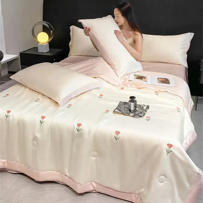 Cream-colored satin bedding set with pink floral embroidery and ruffled hem by decorbites bowknot embroidered summer