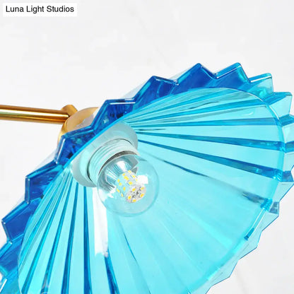DecorBites blue ribbed glass cone pendant light with translucent blue ribbed glass and gold-toned fixture for dining rooms