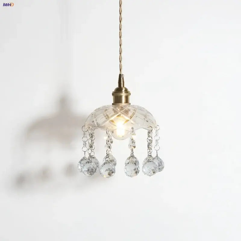 A brass pendant light with clear glass led faceted shade and crystal teardrop pendants by decorbites for dining room decor