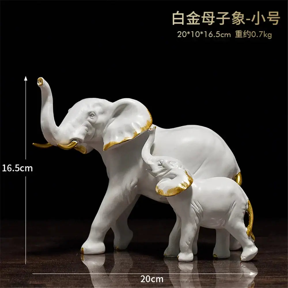 White ceramic mother and baby elephant figurine with gold accents for living room decorbites elephant art decor