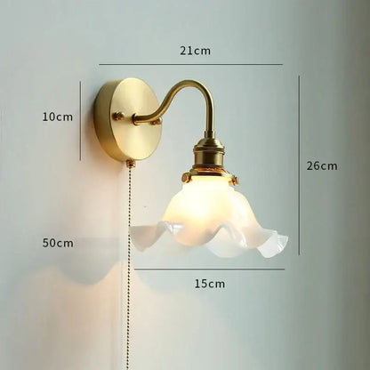 Vintage-style brass glass copper led wall sconce with frosted ruffled shade and pull chain for bedroom mirror lighting