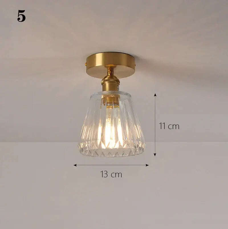 Vintage-style ceiling lamp with brass metal base and clear faceted glass shade pendant for kitchen lights