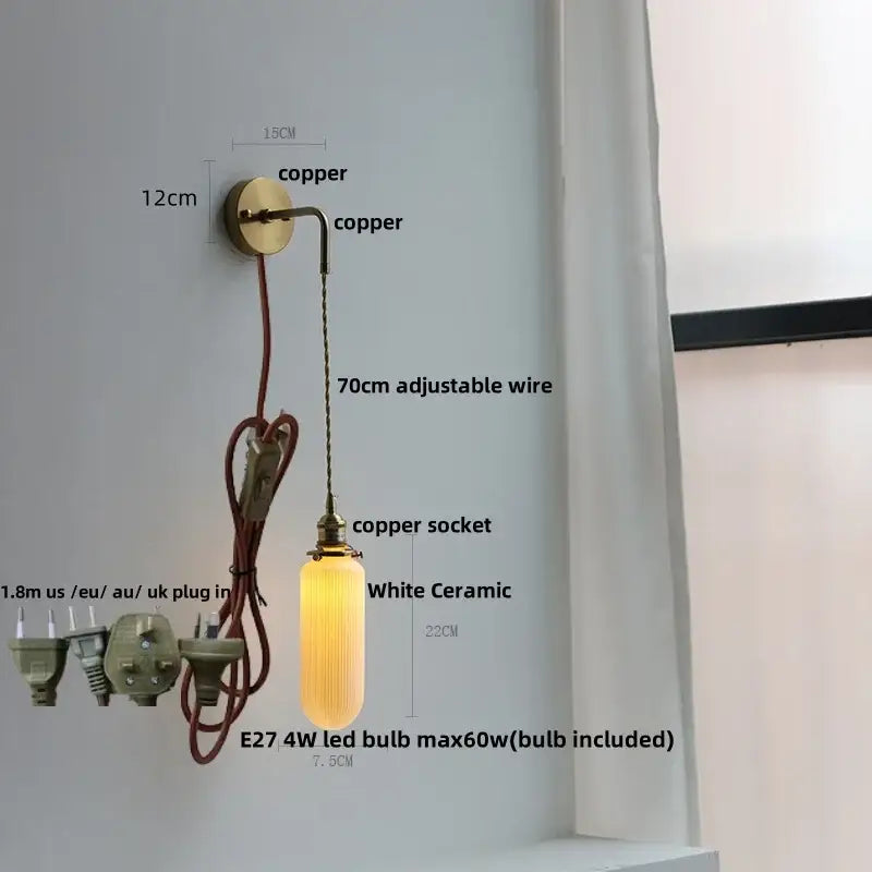 A warm-glowing white ceramic pendant wall light with ribbed glass shade and adjustable copper wire for decorbites led