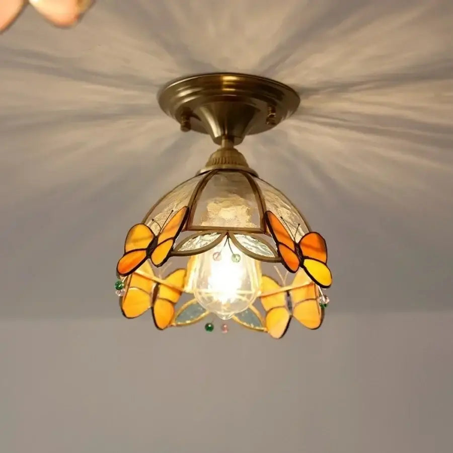 Brass red butterfly glass led ceiling light with stained glass shade featuring orange and yellow butterfly motifs for decorbites butterfly glass decor