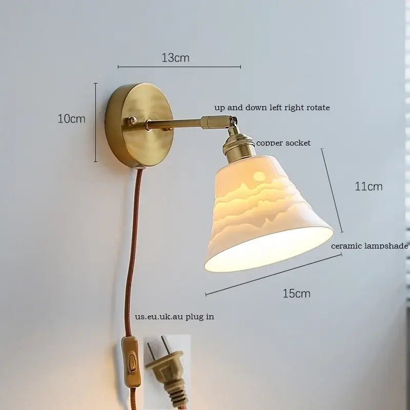 Brass ribbed decorbites ceramic wall sconce with iron arm featuring a brass finish and adjustable copper socket bedroom light