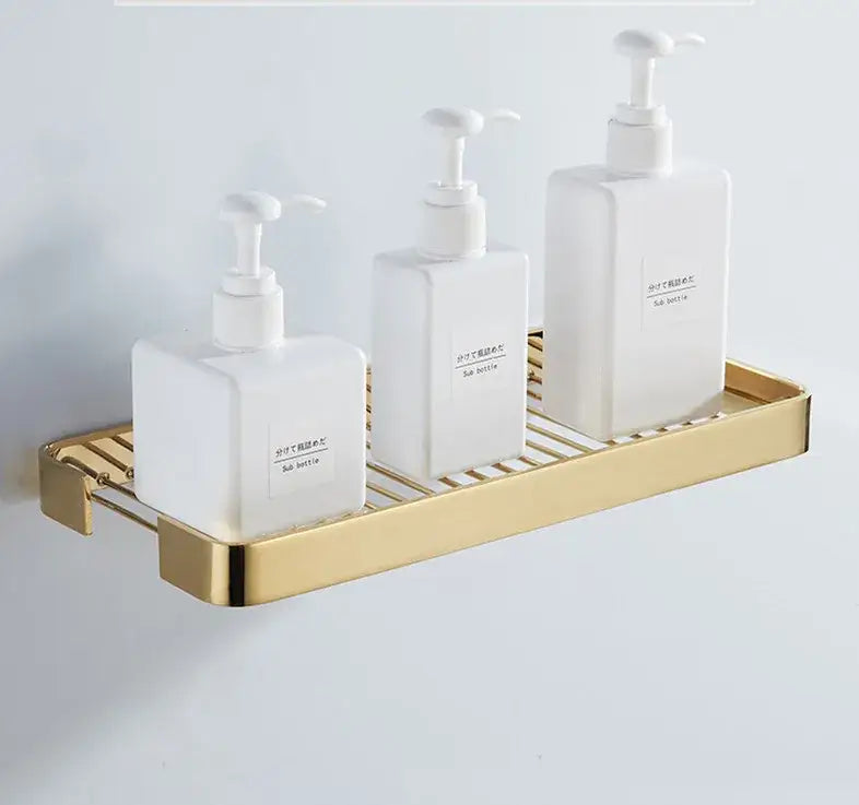Brass square bathroom gold slatted metal shelf with three white soap dispensers for square bathroom shower decorbites