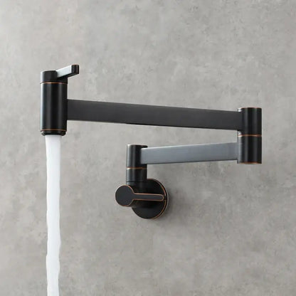 Brass wall mounted pot filler kitchen faucet with black matte finish, articulated gooseneck, and copper-toned accents