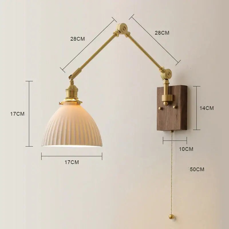 Brass and walnut copper swing arm led wall sconce with adjustable brass finish and cream ribbed glass shade