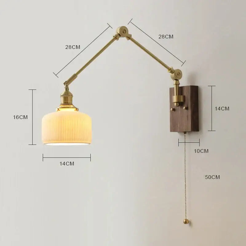 Brass finished adjustable wall sconce with ribbed cream glass shade and wooden mounting plate featuring copper swing arm led design