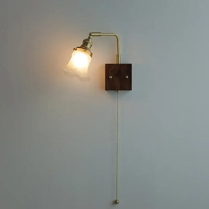 Brass walnut wood wall sconce with brass finish dark wood base amber glass shade and pull-chain switch decorbites brass walnut