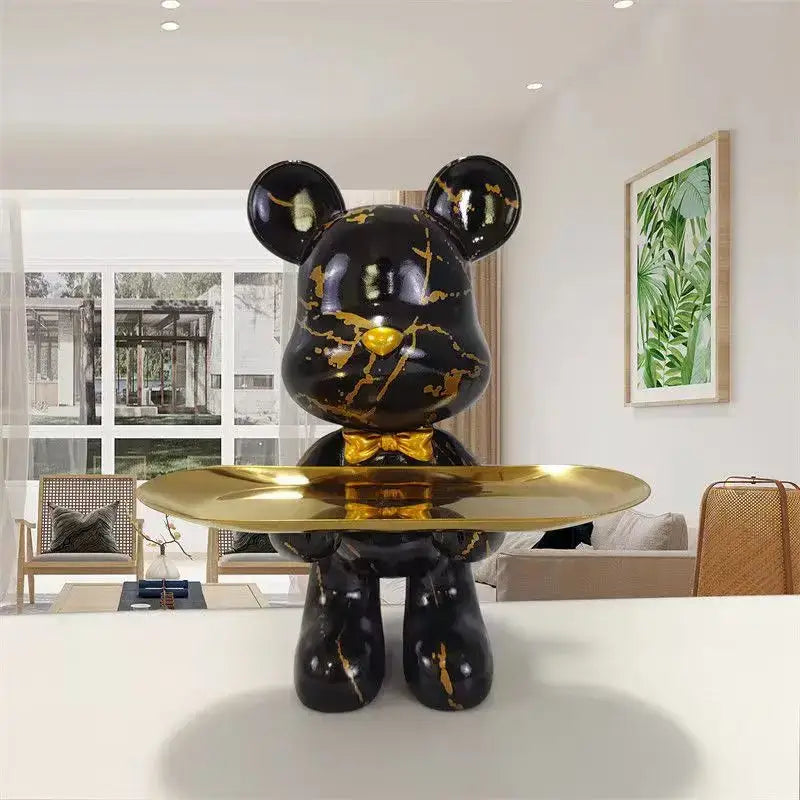 Black marble-finish bear figurine with gold veining and bow tie holding brass tray for living room key decorbites graffiti bear